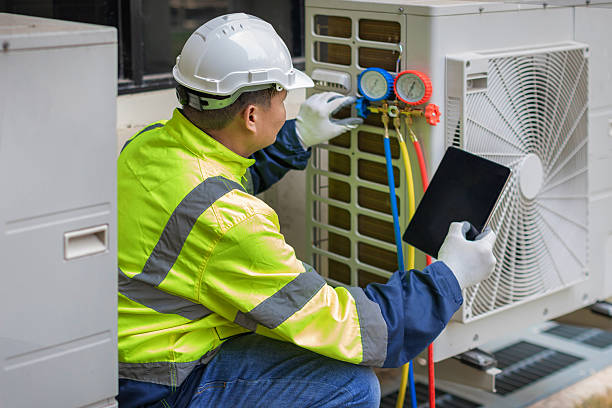 Professional Heat Pump Repair technician working in North Aurora, IL
